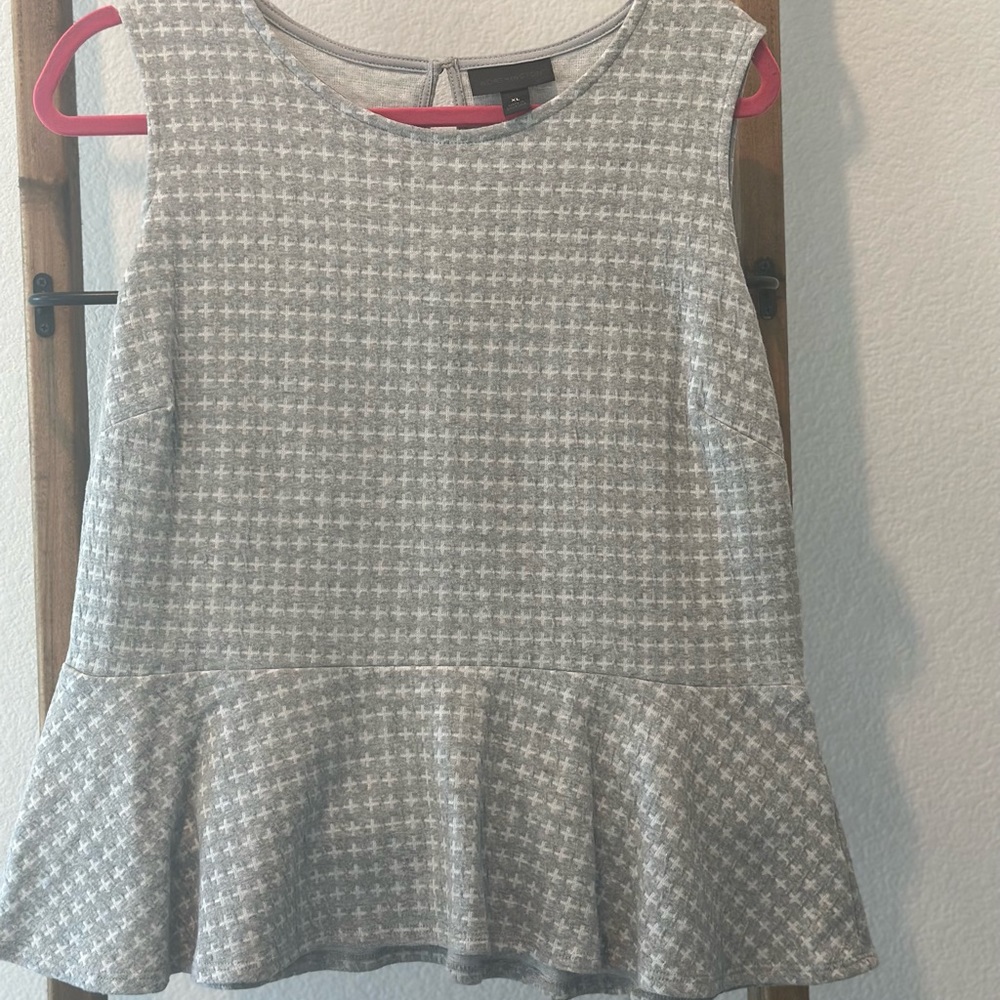 Gray and white peplum top